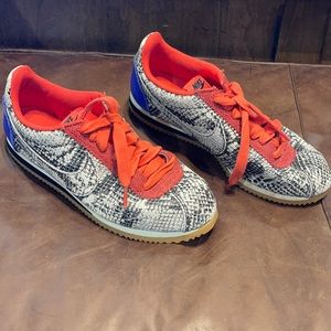 Snake skin print Nike tennis shoes